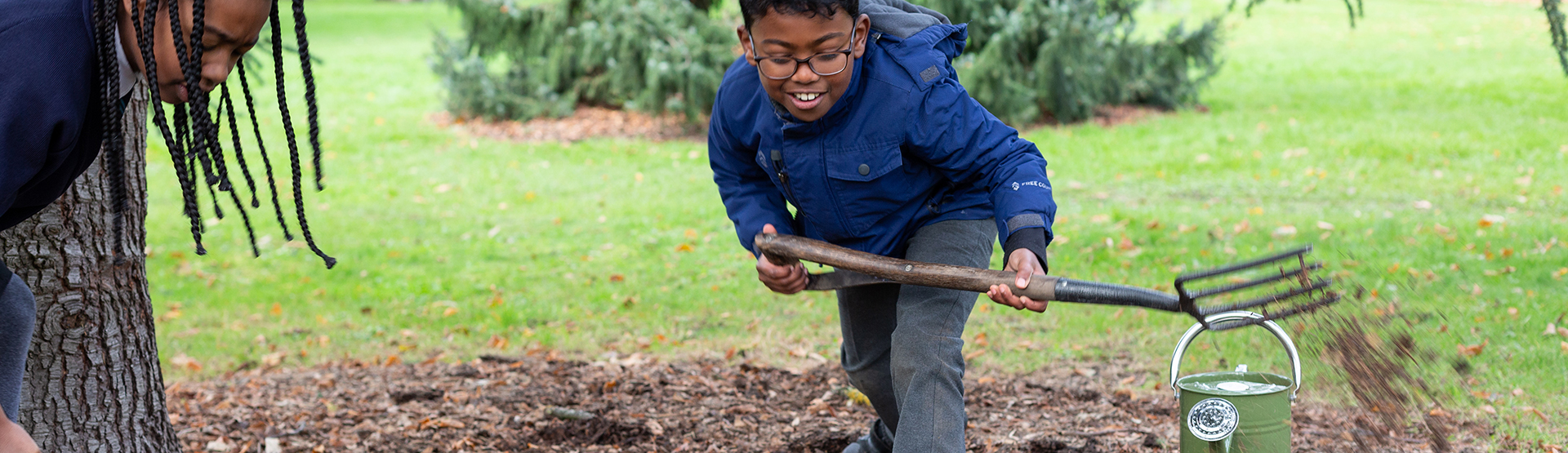 Banner kid digging