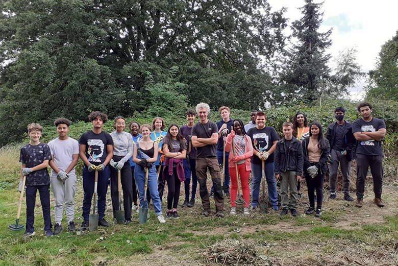 group shot of teenagers and a gardener for a challenge event
